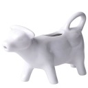 PORCELÁNOVÁ DŽVNA NA MLIEČKU KRAVA NA KRÉM