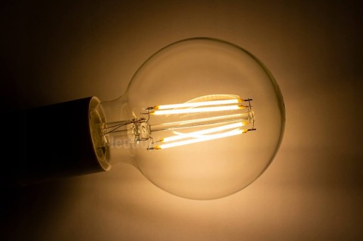 GLOB G95 E27 LED žiarovka 7,5W teplá 3000K 1055lm priehľadná POLUX