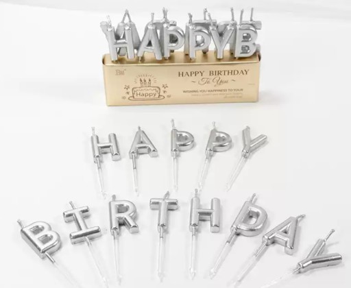 strieborné narodeninové tortové sviečky, nápis HAPPY BIRTHDAY