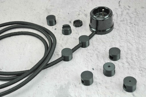 čierny držiak opleteného kábla 8mm loft