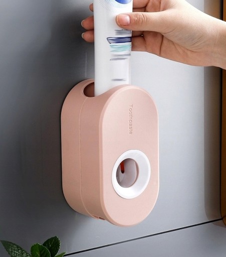 Držiak na vytláčanie zubnej pasty Oral-B, vešiak