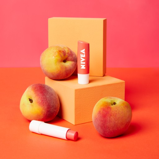 NIVEA PEACH SHINE Ochranný hydratačný rúž 4,8g