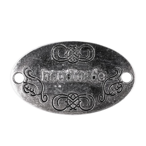 Plechový štítok s nápisom ANTIQUE SILVER musí mať 2672
