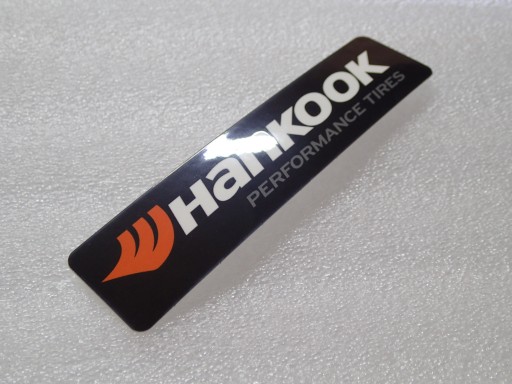 NÁLEPKA PNEUMATÍK HANKOOK LOGO PERFORMANCE PNEUMATIKA 11,5 x 2,8 cm