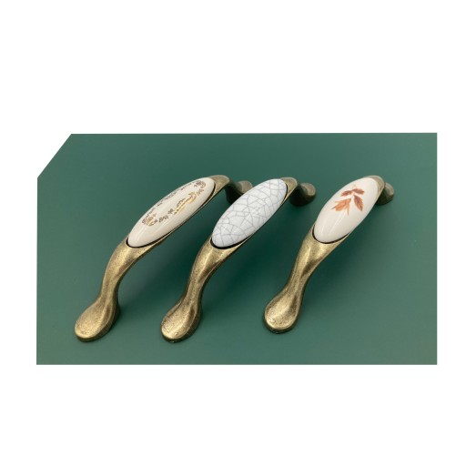 PORCELÁNOVÁ RETRO ZLATÁ NÁBYTKOVÁ ÚCHYTKA mkl-2 96mm