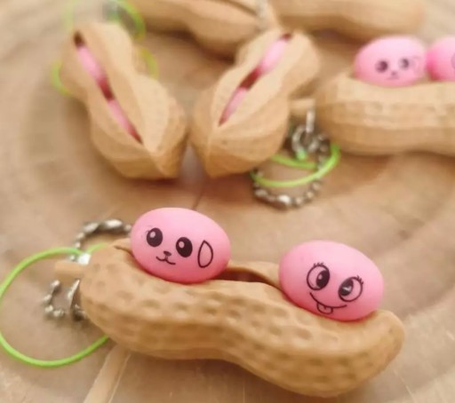 POPIT POPIT FIDGET TOY orech orechy arašidy BRYLOK KEYRING TOY GNIOT
