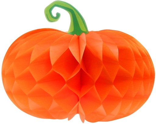 Halloweenska dekorácia z rozeta tekvica rozložená na poličke na parapete stola