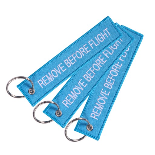 Modrý prívesok na kľúče RBF REMOVE BEFORE FLIGHT