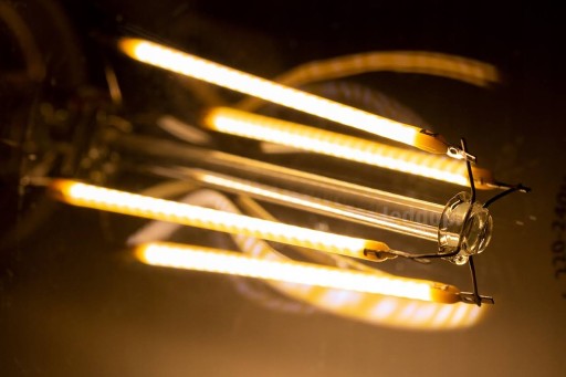 GLOB G95 E27 LED žiarovka 7,5W teplá 3000K 1055lm priehľadná POLUX