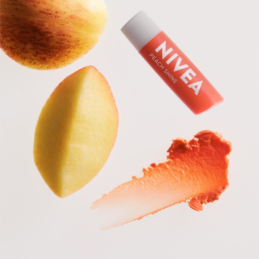 NIVEA PEACH SHINE Ochranný hydratačný rúž 4,8g