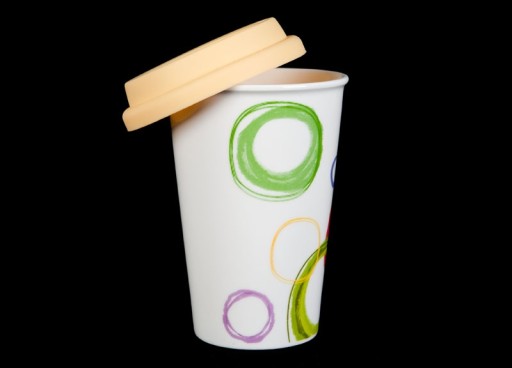 Porcelánový hrnček 400ml, žlté kolieska, silikónový obal