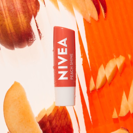 NIVEA PEACH SHINE Ochranný hydratačný rúž 4,8g