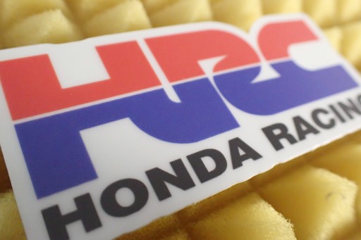 HRC HONDA RACING NÁLEPKA FLUO NÁLEPKA 9 x 4 cm