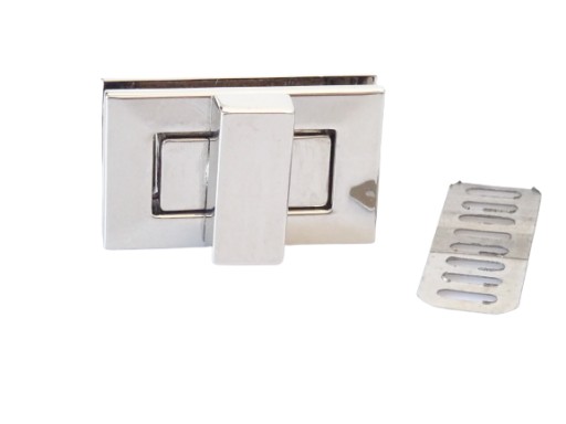 Zips s kovovou sponou. pre tašku niklu 32/18 mm