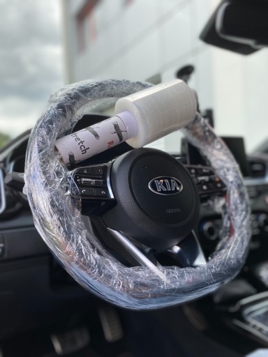 Ochranná fólia na volant s kartónovou rukoväťou