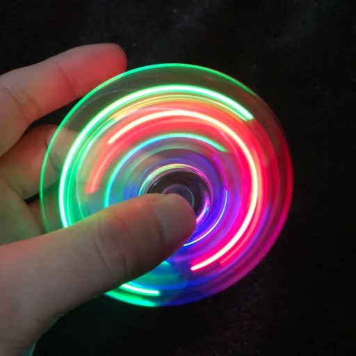 FIDGET SPINNER SVIETIACA LED TRANSPARENTNÁ FAREBNÁ PRÉMIOVÁ HRA PRE DETI