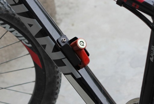 ZÁMKA BRZDOVÉHO KOTÚČA, ZÁMKA MOTOROVÉHO BICYKLA
