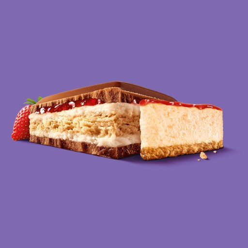 Milka veľká mliečna čokoláda Mmmax Jahodový tvarohový koláč 300g