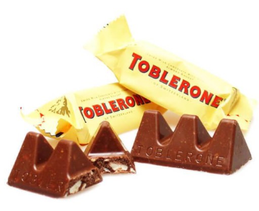 Toblerone mliečne tyčinky s medom a mandľami Medové mandľové tyčinky 200g