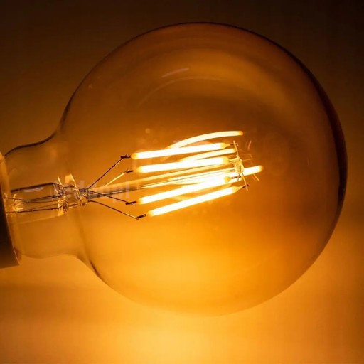 GLOB G95 E27 LED žiarovka 7,5W teplá 3000K 1055lm priehľadná POLUX